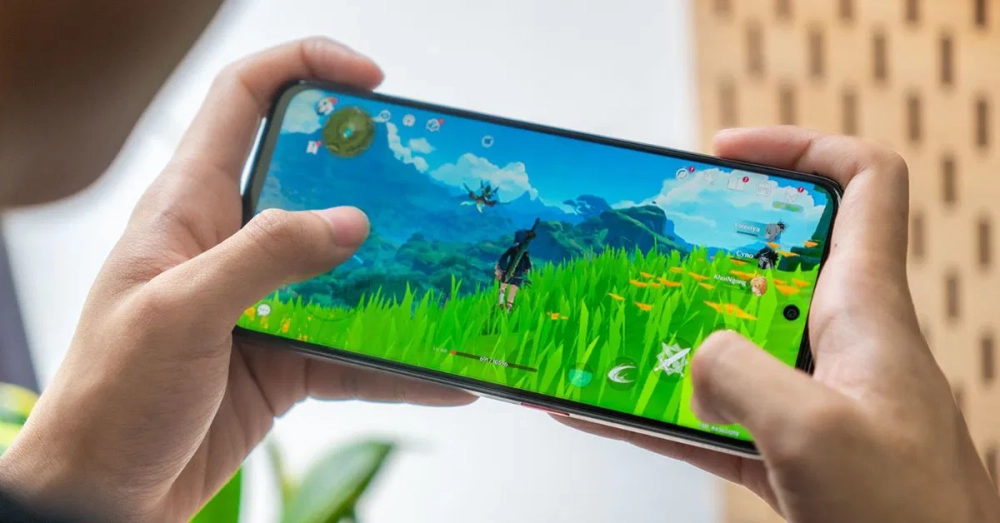 Smartphone đang chạy game đồ họa nặng như Genshin Impact.